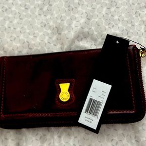 Marc Jacobs clutch wallet. Burgundy with gold trim